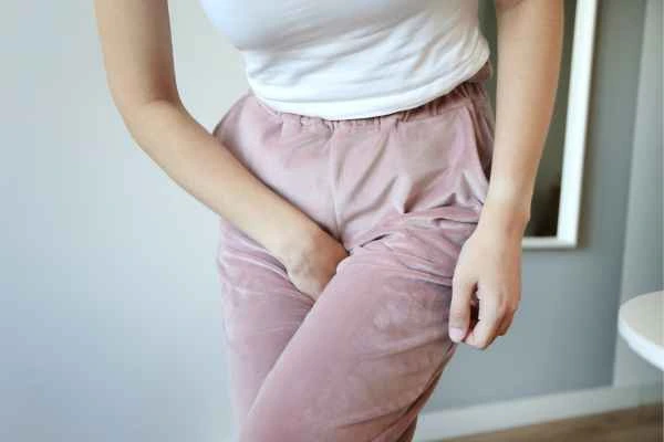 woman struggling with urine incontinence West Acton